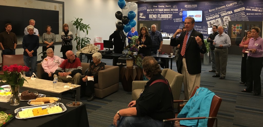 John Maher speaks to the folks assembled at a reception in the lobby of the Reno Gazette-Journal in 2015.