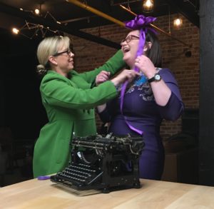 Annie Flanzraich wears a purple ribbon on her head, placed by Reno Mayor Hillary Schieve.